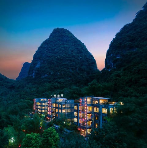 Property building, Nearby landmark, Night, Natural landscape, Mountain view