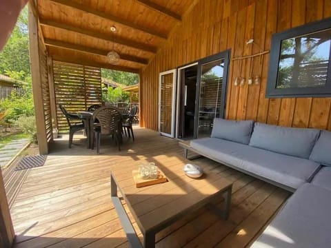 Property building, Patio, Day, View (from property/room), Balcony/Terrace, Living room, Seating area, Dining area, Meals