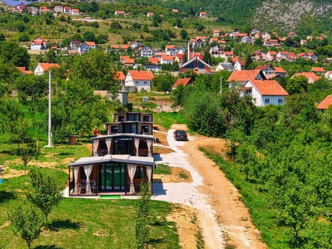 Property building, Spring, Day, Neighbourhood, Natural landscape, Bird's eye view, City view, Mountain view, Street view