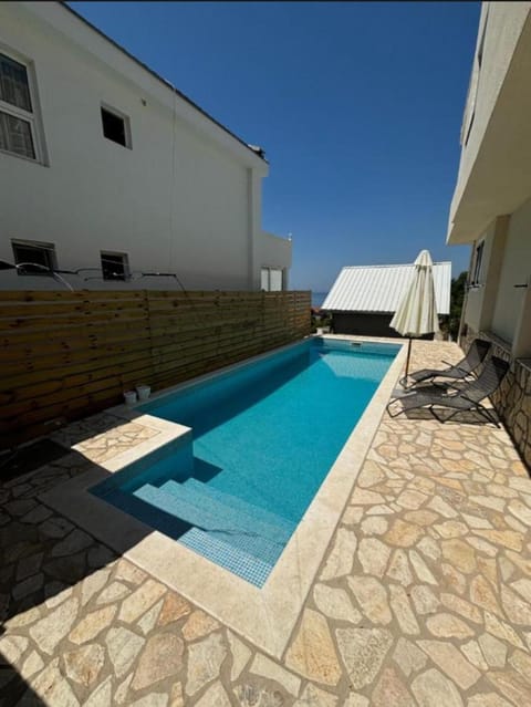 Swimming pool, sunbed