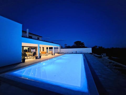 Property building, Night, Pool view, Swimming pool