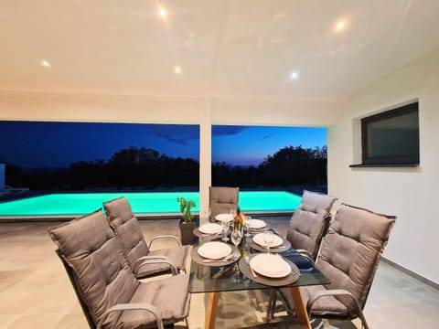 Natural landscape, Seating area, Swimming pool