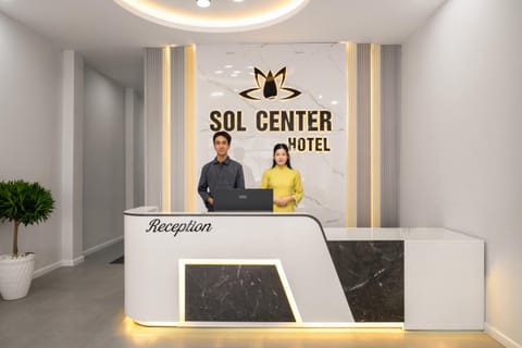Staff, People, Property logo or sign, Lobby or reception, Logo/Certificate/Sign, Text overlay, group of guests, Certificate/Award