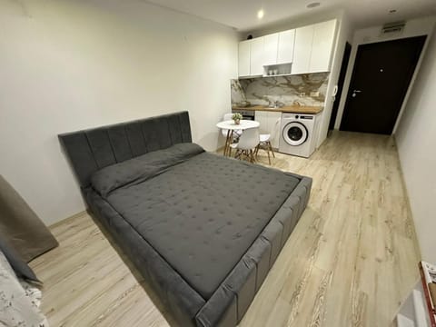 Kitchen or kitchenette, Living room, Photo of the whole room, Bedroom, washing machine