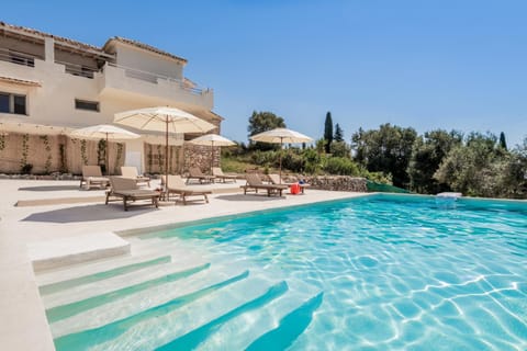 Property building, Day, Natural landscape, Pool view, Swimming pool, sunbed