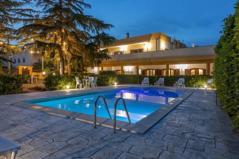 Property building, Swimming pool, Sunset