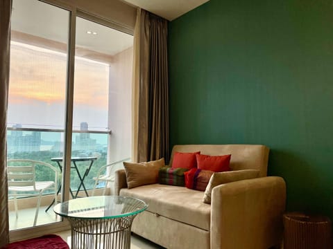 Bed, View (from property/room), Living room, Seating area, Sunset