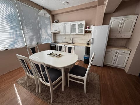 Dining area, dishwasher, oven, stove