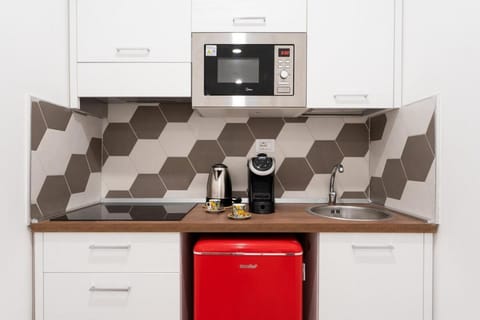 Kitchen or kitchenette, oven, stove