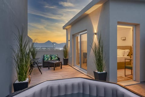 Hot Tub, View (from property/room), Balcony/Terrace, Seating area, Mountain view, Sea view, Sunset, Open Air Bath, furniture, internet