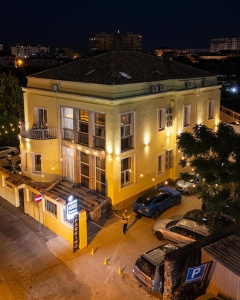 Property building, Night, Neighbourhood, Bird's eye view, City view, Street view, Location, Parking