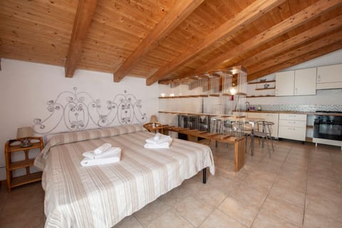 Bed, Kitchen or kitchenette, Dining area, towels