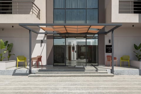 Property building, Facade/entrance, Day, Property logo or sign