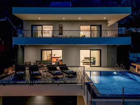Property building, Communal lounge/ TV room, Night, View (from property/room), Balcony/Terrace, Evening entertainment, Pool view, Swimming pool, sunbed
