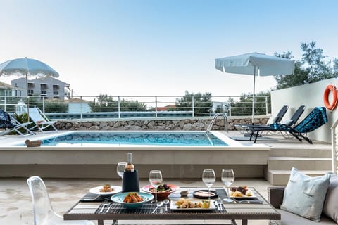 Property building, Living room, Swimming pool