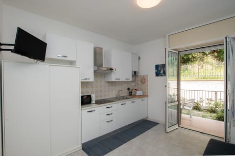 Kitchen or kitchenette, stove