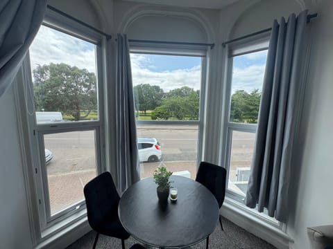 View (from property/room), Living room, Seating area, Dining area