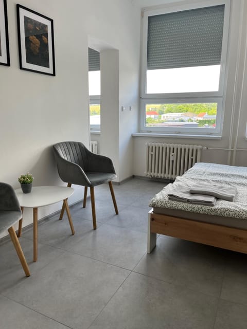Bed, Living room, Seating area, Bedroom