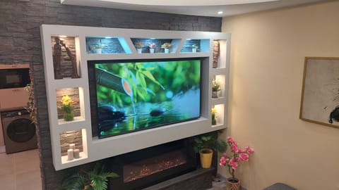 Communal lounge/ TV room, fireplace