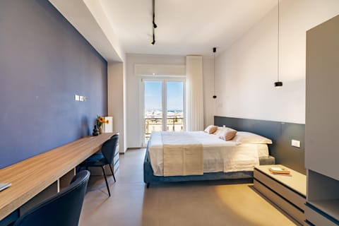 Bed, View (from property/room), Bedroom, City view, Landmark view, Sea view, furniture, wardrobe