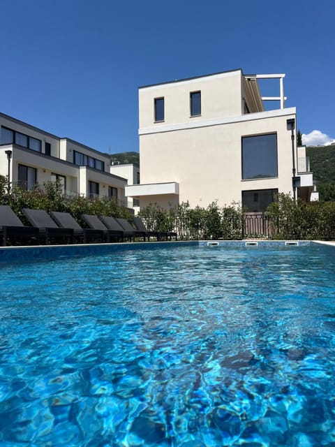 Property building, Pool view, Swimming pool, sunbed