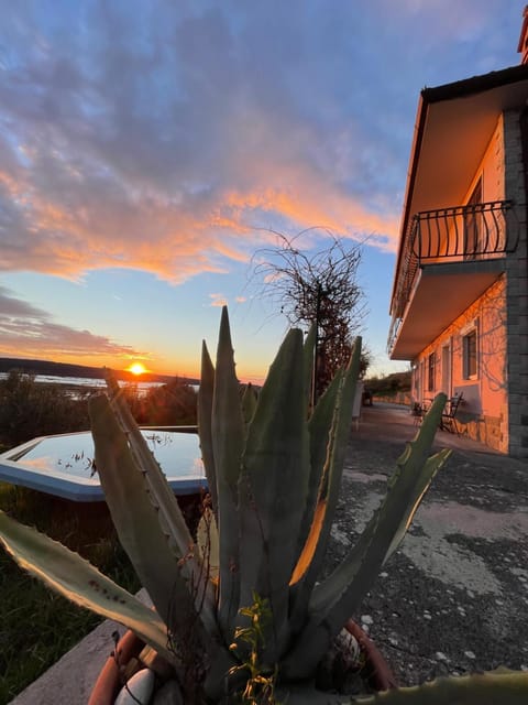 Toilet, Patio, Natural landscape, Sunset