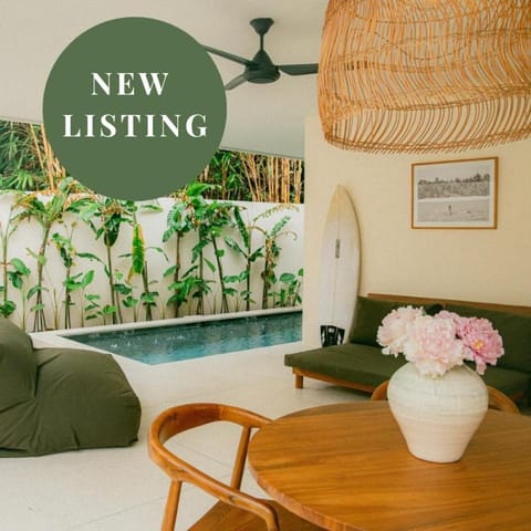 Living room, Seating area, Text overlay, Pool view, Swimming pool