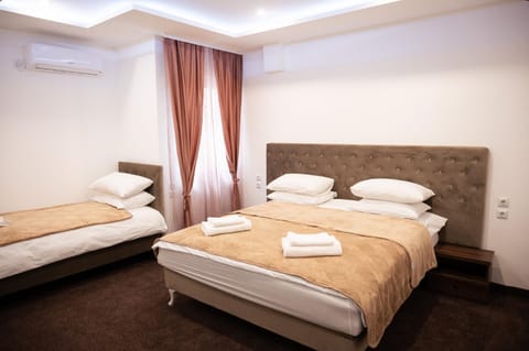 Bed, Bedroom, towels, air conditioner