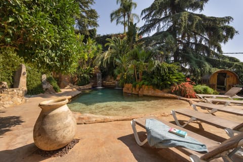Property building, Living room, Swimming pool