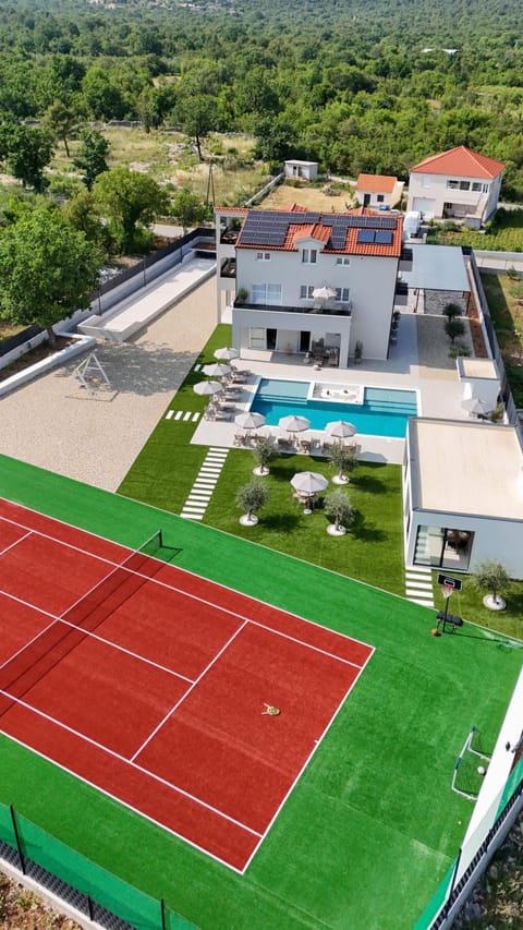 Property building, Day, Tennis court, Pool view, Swimming pool