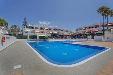 Property building, Living room, Swimming pool