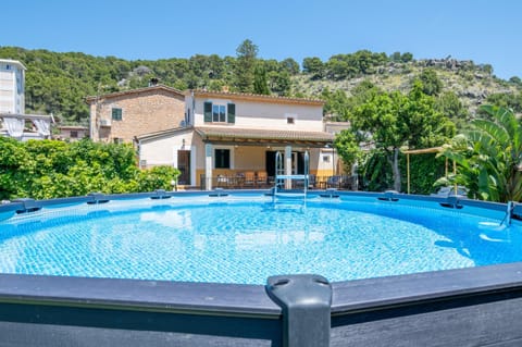 Property building, Living room, Swimming pool