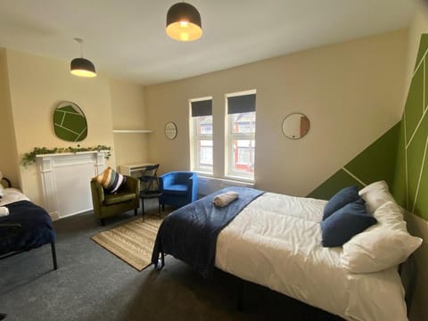 Bed, Seating area, Bedroom