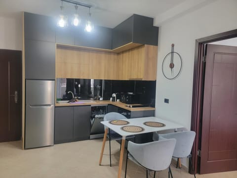 Kitchen or kitchenette, Dining area, dishwasher, stove