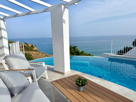 Property building, Living room, Swimming pool