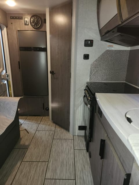Kitchen or kitchenette, stove