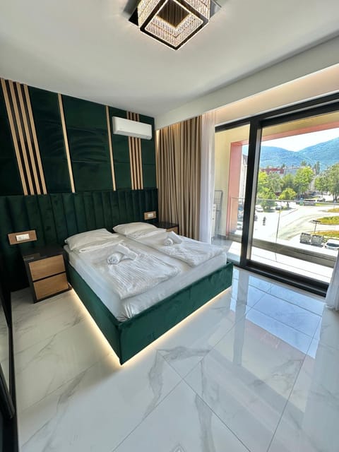 Bed, Photo of the whole room, Bedroom, towels, air conditioner