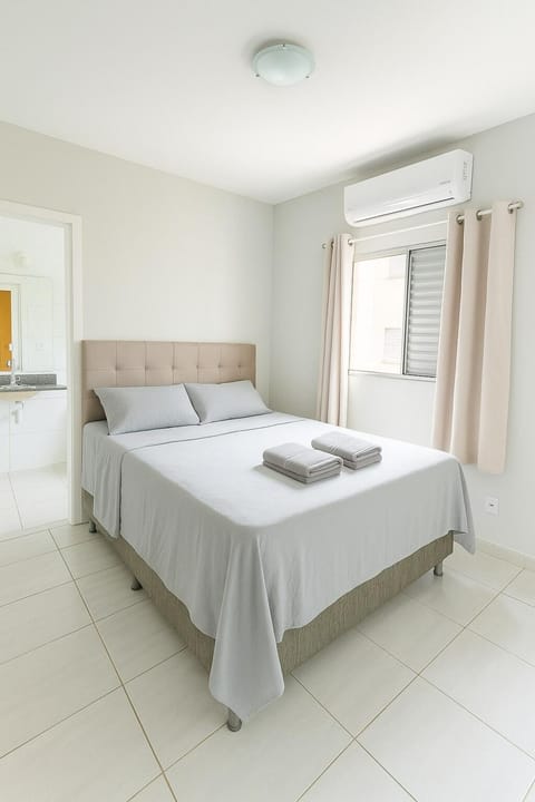 Bed, Photo of the whole room, Bedroom, towels, air conditioner