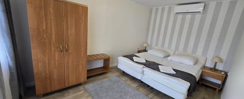 Bed, Bedroom, towels, air conditioner