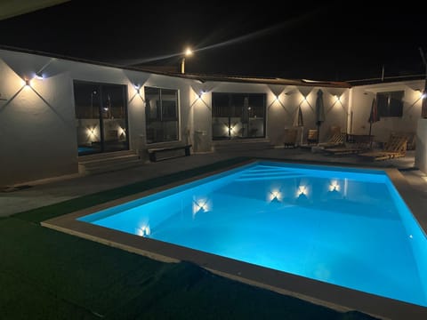 Night, Pool view, Swimming pool, sunbed