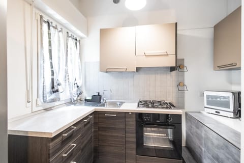 Kitchen or kitchenette, oven