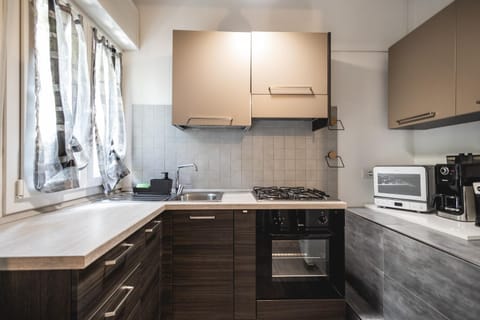 Kitchen or kitchenette, stove