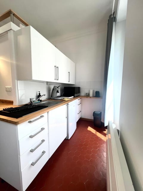 Kitchen or kitchenette, stove