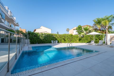 Property building, Living room, Swimming pool