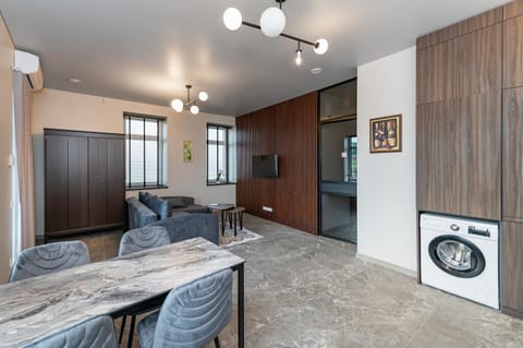 TV and multimedia, Kitchen or kitchenette, Living room, Seating area, Evening entertainment, wardrobe, washing machine, air conditioner