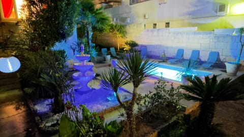 Shower, Property building, Night, Garden, Swimming pool, towels