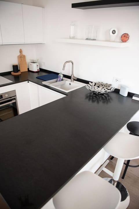 Kitchen or kitchenette, stove