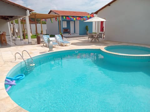 Patio, Natural landscape, Pool view, Swimming pool, sunbed