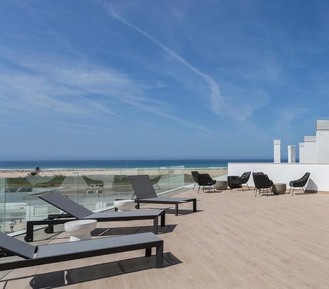 View (from property/room), Pool view, Sea view, Swimming pool, sunbed
