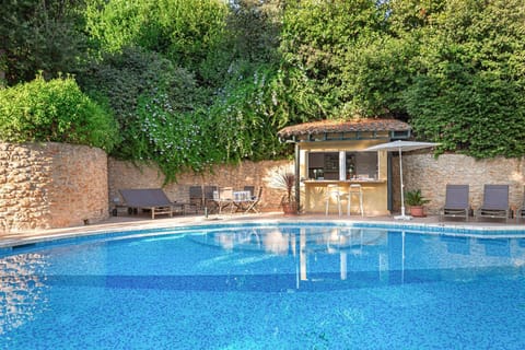 Property building, Living room, Swimming pool